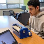 Jose taking the AAPPL on his Braille machine